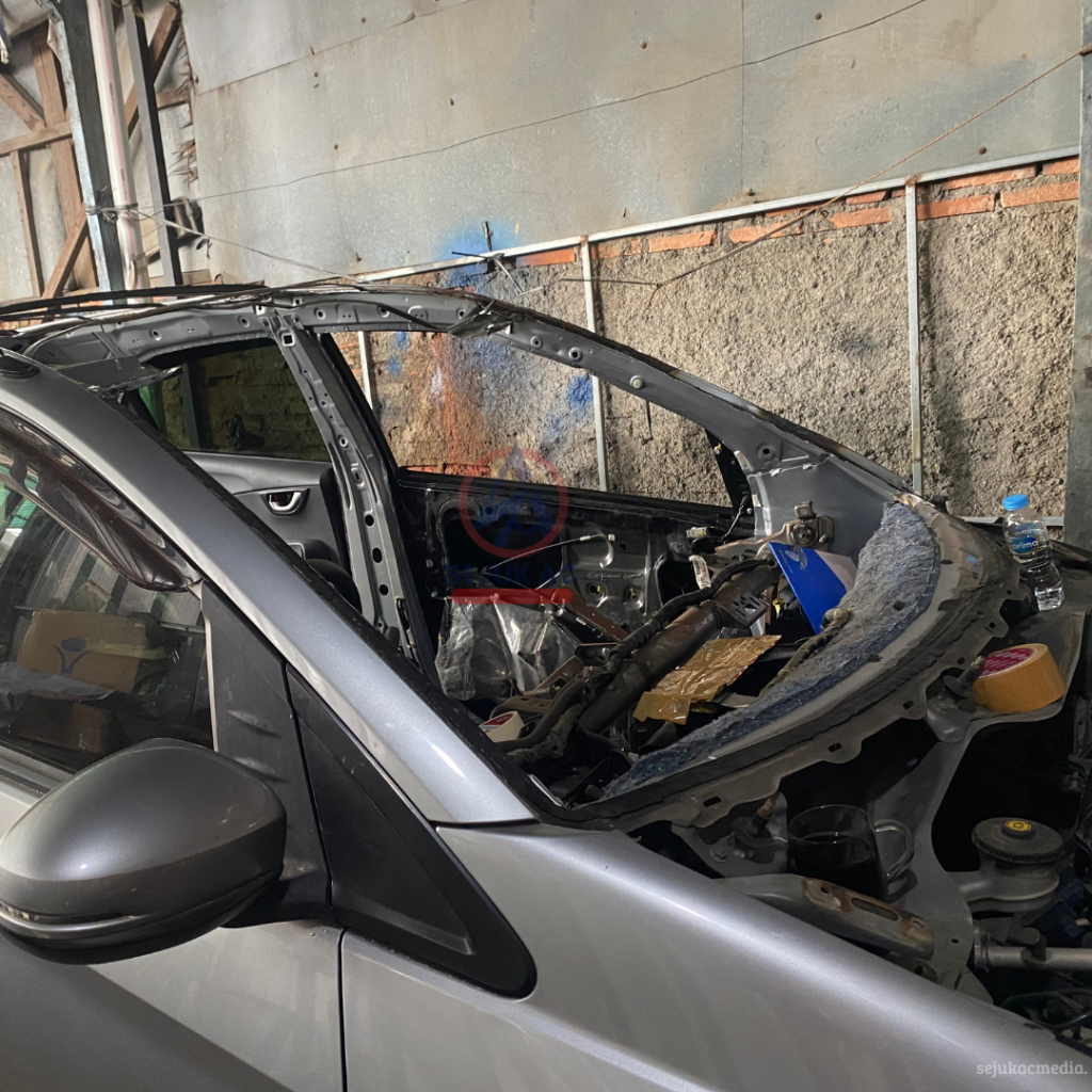 penyebab bodi mobil penyok