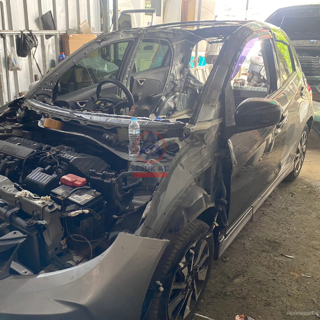 penyebab bodi mobil penyok